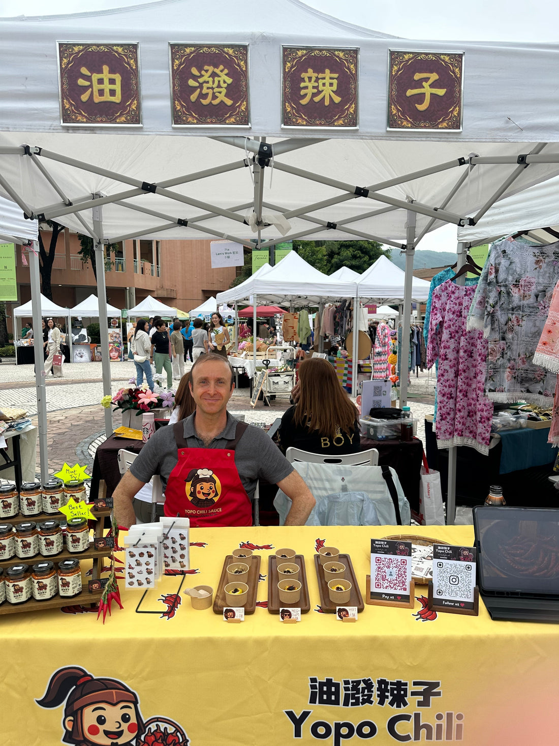 YoPo Chili greeting repeat customers at DB Weekend Market Mother’s Day 2026